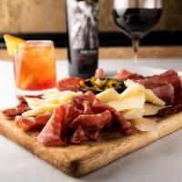 Antipasto Board · Family made. Cured meats, cheese, olives, hot pepper relish served with a warm bread basket.