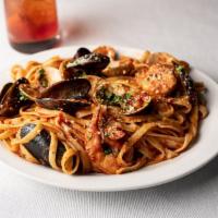 Fettucini Seafood Casino · Shrimp, clams, mussels, marinara sauce.