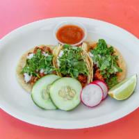 Tacos · Each. Corn tortilla served with the meat of your choice. Topped with onion, cilantro, cucumb...