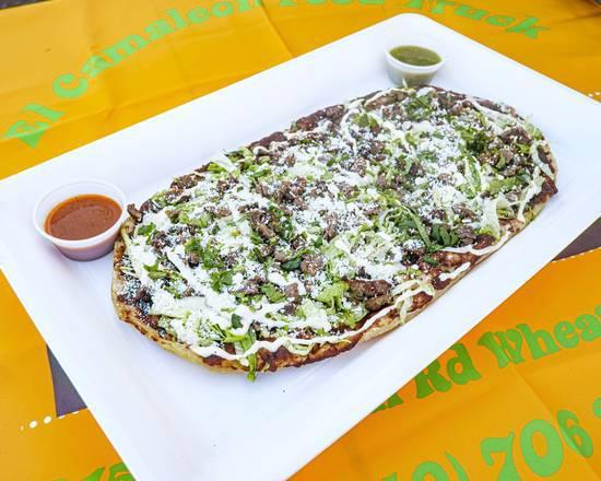Huarache · Each. Handmade thick tortilla with the meat of your choice. Topped with onion, cilantro, cream, cheese, and hot sauce to taste.