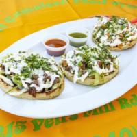 Sopes · Each. Small handmade thick tortilla with meat of your choice. Topped with onion, cilantro, c...