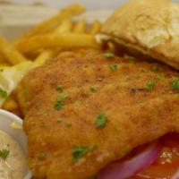 Crispy Cod Sandwich · 4 oz cod hand breaded, GF bun, WTF sauce, cole slaw, tomato, onion, side of pickles and choi...