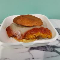 Crispy Chicken Parm · Crispy chicken topped with marinara and melted mozzarella on a toasted bun.