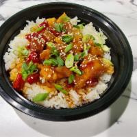 Sweet & Sour Chicken Rice Bowl · Peppers, onions and pineapple tossed in sweet and sour sauce.  Garnished with green onions a...