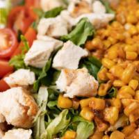 Cobb Salad · Chilled grilled chicken, cucumbers, onions, roasted corn, avocado, tomato and hard-boiled eg...