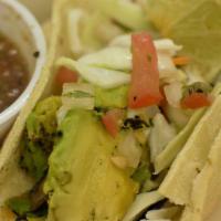 Grilled Avocado · Grilled sliced avocado with pico de gallo and shredded cabbage.  And served in corn tortillas.