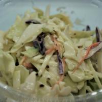 Coleslaw · Shredded cabbage and carrots.  Mixed with our creamy coleslaw dressing.