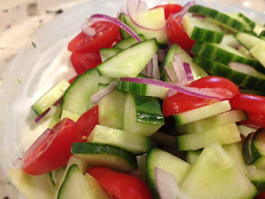 Cucumber Salad · Cucumber, tomatoes, Red Onion, olive oil, lemon juice and balsamic vinaigrette.