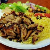 Lamb/Beef Gyro Rice Platter · Lamb/beef gyro, lettuce, cucumber and tomatoes served over basmati rice.