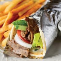Deluxe Lamb/Beef Gyro wrap · Lamb Gyro, lettuce, onion, cucumber, tomato and tzatziki sauce wrapped in pita bread.