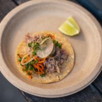 3 Pieces Pork Carnitas Taco · Slowly cooked with carrots, cabbage and onions.