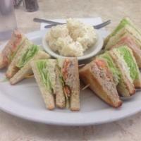 Tuna Salad Club Sandwich · 3 slices of bread and two layers of filling.