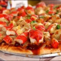 Maryland Crab Pizza · Jumbo lump crab meat, onions, green peppers and blended with mozzarella cheese, topped with ...
