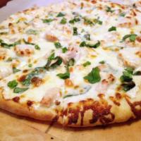 Alfredo Pizza · Alfredo sauce with your choice of grilled chicken or shrimp.