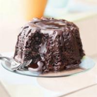 Molten Chocolate Bundt Cake · Moist dark chocolate cake surrounded with dark chocolate and filled with a dark chocolate tr...