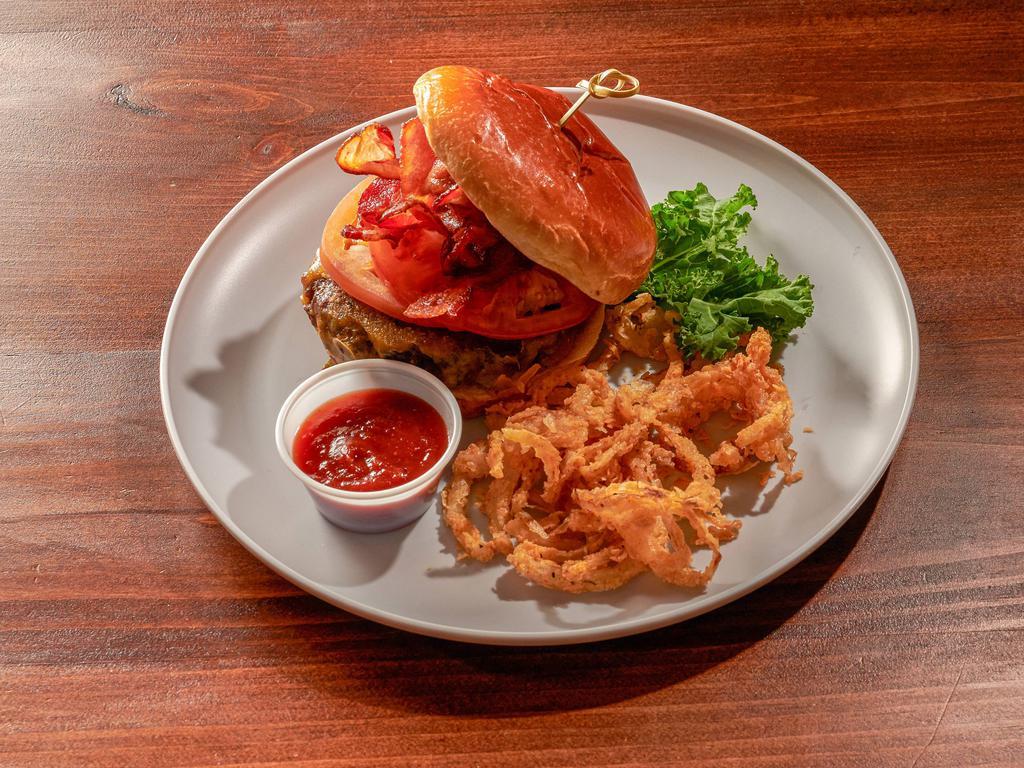 Bacon BBQ Burger · All natural beef, cheddar, Applewood smoked bacon, tomatoes, fried onion strings, hickory BBQ and brioche bun. 