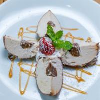 TARTUFO · Caramel center surrounded with peanut butter gelato covered with milk chocolate