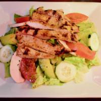 San Antonio Salad · Fresh lettuce, tomatoes, cucumbers, mushrooms and avocados, topped with a house dressing.