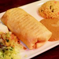 Chimichanga · Quickly deep fried. Served with pico de gallo and sour cream.