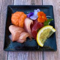 Assorted Sashimi · Assorted sashimi with tuna, salmon, albacore and yellowtail.