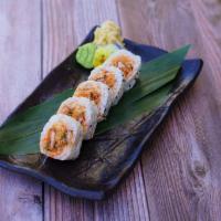 Spicy Softshell Crab Roll · Tempura fried Softshell crab, scallion, masago, mixed in spicy sauce wrapped in soy paper.