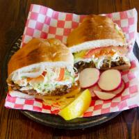 Torta a la Carte · Choice of meat, mayo, refried beans, lettuce, tomato, avocado, sour cream, and cheese.