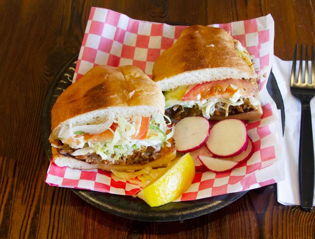 Torta a la Carte · Choice of meat, mayo, refried beans, lettuce, tomato, avocado, sour cream, and cheese.