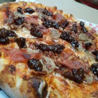 Sweet Pig Pizza · House made sausage, bacon, prosciutto, pineapple fig jam, provolone & mozzarella