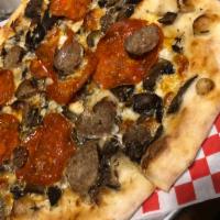 Woodsman Pizza · mushroom, cream sauce, sausage, pepperoni, mozzarella, provolone