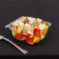 Bionicos  · Fresh mixed fruits with homemade crema, granola mix, and coconut flakes (contain nuts)
