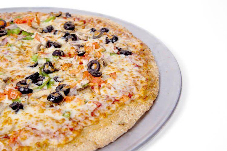 Small Heavy Veggie Pizza · Mushroom, green pepper, black olive, Roma tomatoes, red onions, extra cheese, and red sauce.