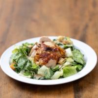 The Cuzco Caesar Salad (New Ingredients) · Our charcoal chicken, crunchy croutons, cherry tomatoes, and parmesan cheese on a bed of rom...