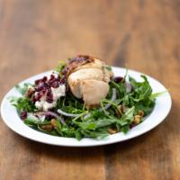 The Inca Salad · Our charcoal chicken, red onions, cranberries, walnuts and goat cheese on a bed of arugula. ...