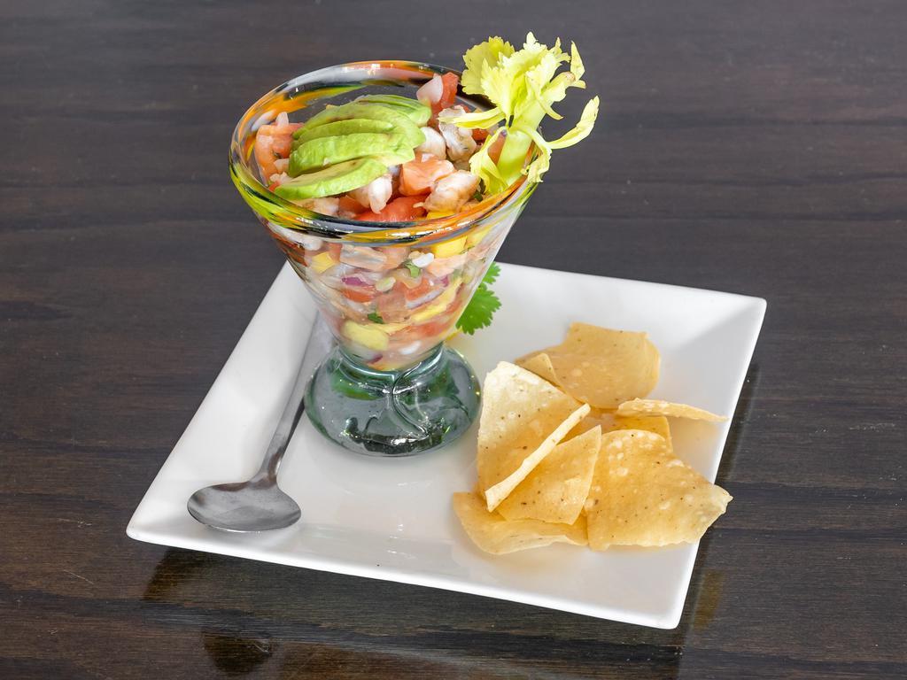 Los Mariachis Lime Ceviche · A mix of shrimp, salmon and tilapia cooked in fresh lime juice, crushed tomatoes, red onions, fresh peppers, mango and cilantro, garnished with fresh avocado.