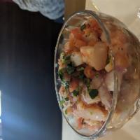 Shrimp Ceviche · Shrimp, tomatoes, red onions, cilantro, jalapeno, cured in citrus juice.