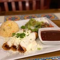 Flautas  · Lightly crisped rolled corn tacos filled with pulled chicken and topped with cotija cheese, ...