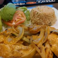 Pollo Bravo · Grilled chicken strips, onions, and green bell peppers cooked in our homemade chipotle cream...