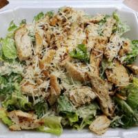 Chicken Caesar Salad · Romaine lettuce with chicken, Parmesan, croutons and Caesar dressing on the side.