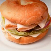 Turkey  Lunch Sandwich · Served with cheese, tomato, onion, lettuce, pickles, jalapenos, mayo, mustard and choice bre...
