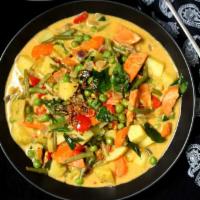 Vegetable Korma · Mixed vegetables cooke din a light yellow cream sauce with chef’s special selection of herbs.
