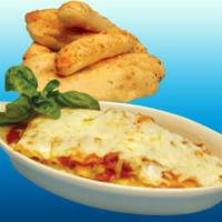 Chicken Parmesan · Served with spaghetti, smothered in our signature meat sauce, topped with melted mozzarella ...