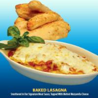 Cheese Lasagna · Blend of mozzarella, ricotta, and Romano cheeses. Smothered in our signature meat sauce, top...