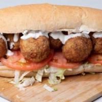 Woe Po Boy · Our spin on boudin balls a Louisiana classic. Fresh crisp lettuce, sliced to order tomatoes,...