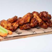 BBQ Delight Wings · Sweet, bold, and salty, and the slightest hint of spicy. Served with carrots, celery and you...