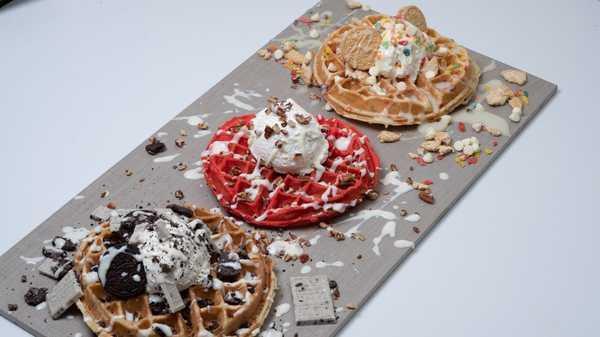 Astonishinghly good cake Batter Waffle · Every bite will have your experiencing that m. and that ooh. Available is fruity pebbles, red velvet and cookies and cream.