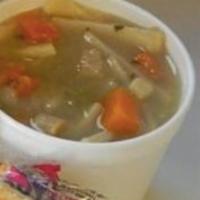Chicken Noodle Soup · 12 oz bowl of old fashioned chicken noodle soup, with packets of saltine crackers.
