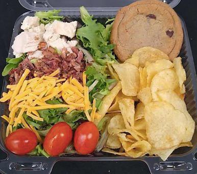 Salad Box Lunch · Individual box lunch with Half Salad, Kettle Chips, and Cookie. Salad Choices: Chicken/Bacon/Ranch, Chicken Caesar, or Garden Salad. Consider adding a bottled drink.