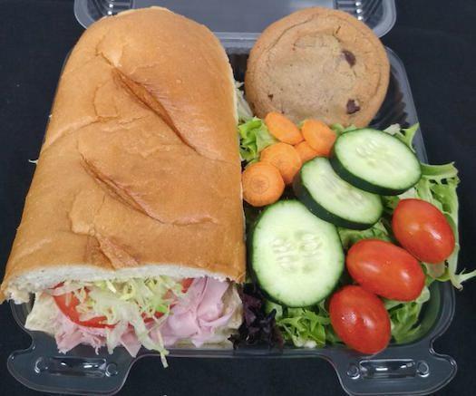 Sub & Garden Salad Box Lunch · Individually boxed Sub, Garden Salad, and Cookie. Sub includes lettuce and tomato with packets of mayo/mustard. Salad contains spring mix, cucumber, tomato, carrots, croutons & house dressing. For regular subs with your choice of toppings and/or extra toppings, order from the Sandwich Menu, not a Box Lunch.  Consider adding a bottled drink.