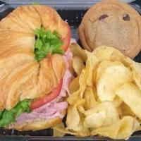 Croissant Box Lunch · Individually boxed Croissant Sandwich, Kettle Chips, and Cookie. Sandwich made with lettuce,...
