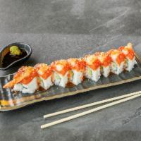 Bear Claw Roll · Eight pieces. Crab salad and cucumber. Topped with shrimp tempura and spicy tuna.